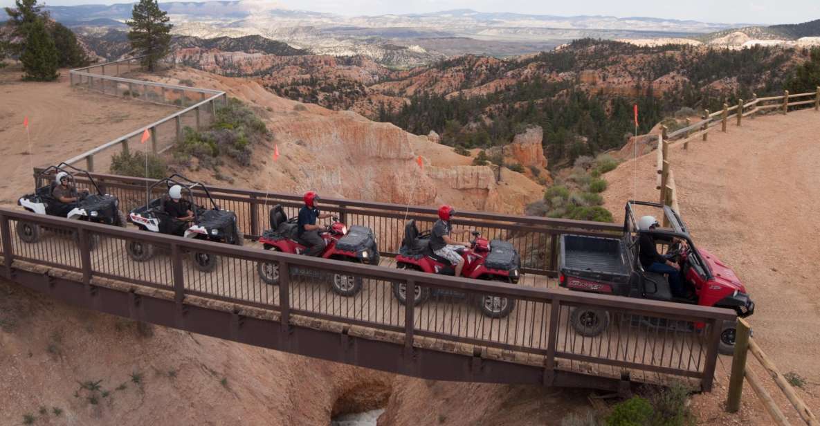 ATV Tour ride of Bryce Canyon National Park with ATVs driving across a wooden bridge with desert views in the background.